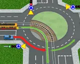 Rondo z tramwajem i samochodem. Zielona strzałka pokazuje, kiedy tramwaj ma pierwszeństwo, a czerwona droga dla samochodu.